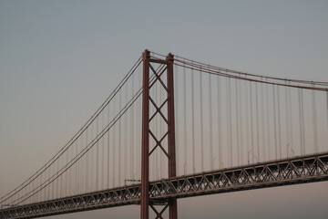 Breathtaking suspension bridge Lisbon skyline views from balcony of modern cruiseship cruise ship...