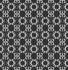 Seamless abstract pattern of white on gray background for wallpaper or fabric