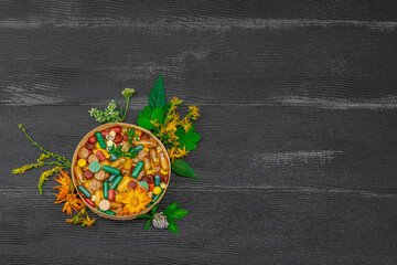 Plant based supplements, natural vitamins, fresh herbs and flowers. Organic ingredients medication