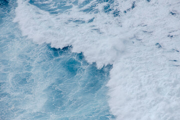 Huge crushing waves seen from above creating amazing textures. 