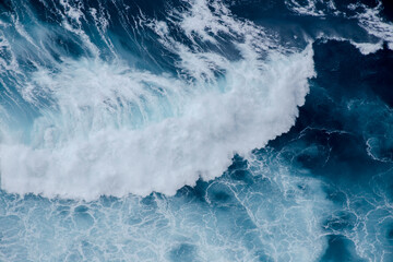 Huge crushing waves seen from above creating amazing textures. 