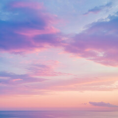 dreamy pastel-colored sky filled with soft pink, lavender, and peach hues just before sunrise 