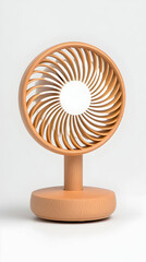 Compact, beige desk fan with a circular blade design