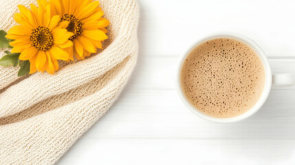 Cozy autumn scene coffee cup, knitted scarf, and sunflowers on white wood