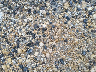Close-up of a Colorful Pebble and Gravel Surface with Mixed Textures