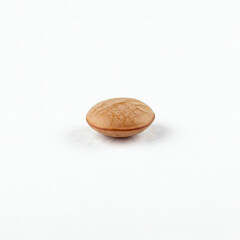Fototapeta premium Lentil seed close-up on white background