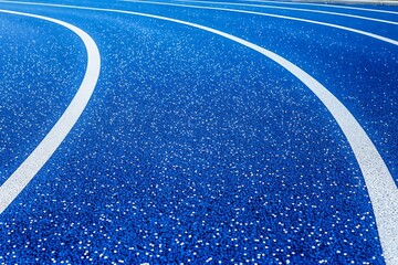 Blue Running Track Lanes A Close-Up Image of a Modern Running Track.