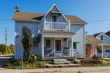 Small 19th century heritage house in St. Jacobs small town, with historic design.