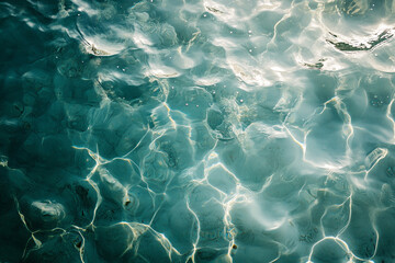 Obraz premium Soft Water Ripples Create Mesmerizing Patterns Under Sunlight in a Serene Pool Setting