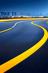 Night highway curves towards a city skyline