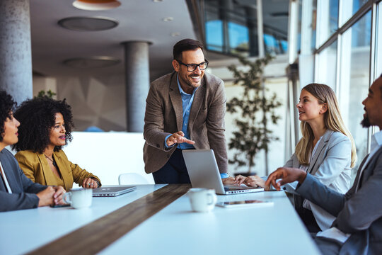 Team Collaboration During a Business Meeting in a Modern Workplace Environment