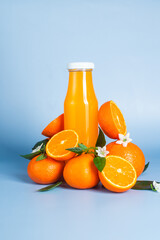 Orange juice in a glass bottle. Citrus