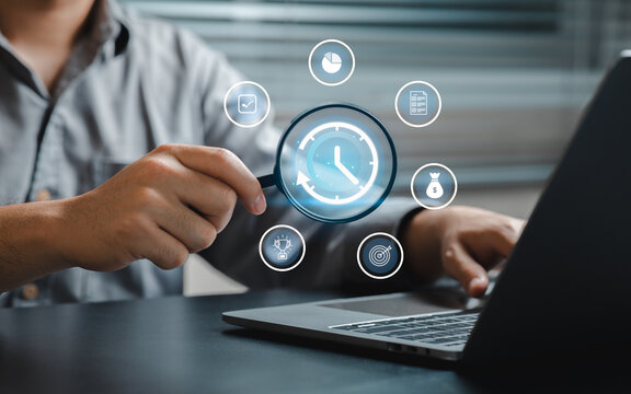 Business Analysis with Magnifying Glass and Laptop for Productivity