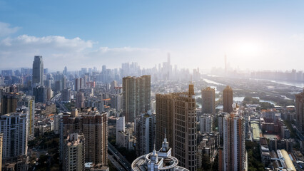 Naklejka premium Breathtaking Aerial View of a Thriving Urban Cityscape at Sunrise