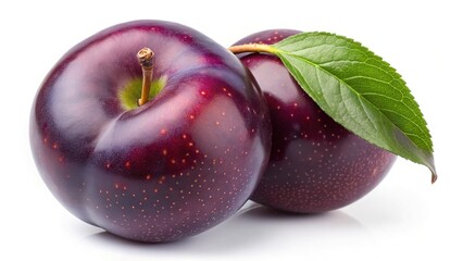 Two ripe juicy plums with a fresh green leaf isolated on white background delicious fruit healthy snack vitamin rich antioxidant power