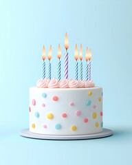 Pastel birthday cake with lit candles on a light blue background