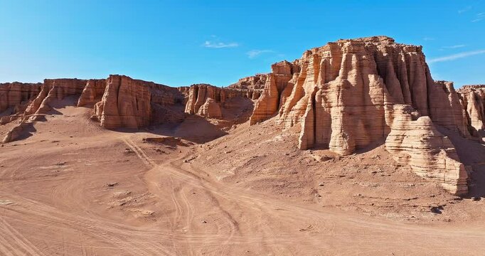 Scenic landscape of yardang landform mountain in desert. Famous Dahaidao no man's land natural scenery in Xinjiang, China.