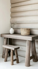 Rustic wooden table and stool against log wall