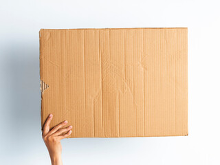 Posters of cardboard in his hands. Isolated on white. Set. Copy space. Hand-held cardboard cutout on white background. © Luqman Aditiamala