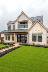 This stunning two-story residence features expansive windows, a meticulously kept lawn, all set within a charming suburban neighborhood beneath a soft, cloudy sky