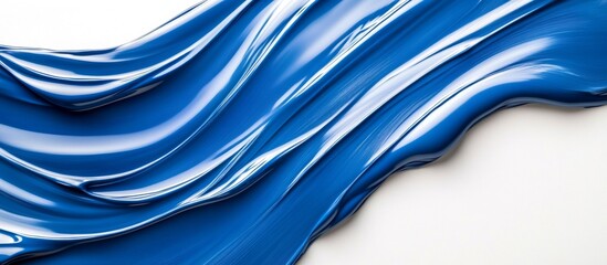 Mesmerizing flow of cobalt blue metallic paint on white background, smooth liquid-like texture, abstract artistic design
