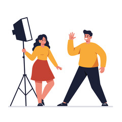 Two people posing in a studio with lighting, flat design vector art