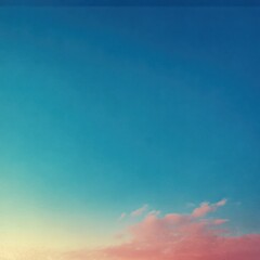 Obraz premium A blue sky with a pinkish hue. The sky is clear and the sun is shining brightly