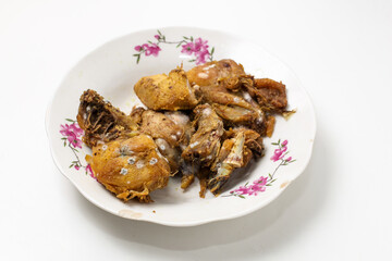 rotten fried chicken on a plate