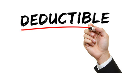 Hand Writing Deductible with Black Marker on Transparent Surface Financial Concept