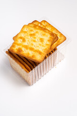 Cream crackers in a clear plastic container. A popular snack throughout Southeast Asia and even in parts of China.