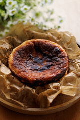 Close up of Basque cheesecake on baking paper
