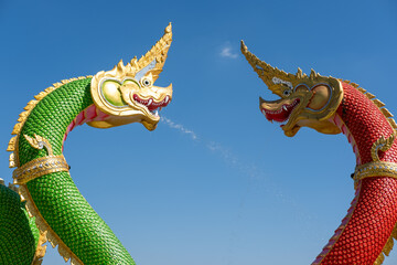 Naga Statues with water flowing. At Wat Saman Rattanaram, Chachoengsao , Thailand