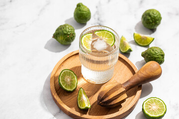 fresh water with lime, lemon, cold refreshing summer drink