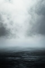 Fototapeta premium Moody Seascape Dark Gray Clouds Over a Foggy Sea