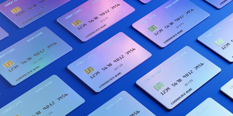 Multiple Credit Cards Arranged on Blue Background in a Stylish Pattern