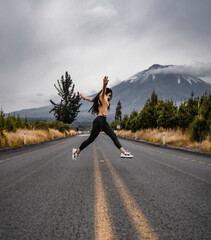 Women jump on the road
