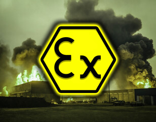 ATEX directive regulation (Equipment intended for use in explosive atmospheres) sign in front of burning industrial warehouse
