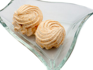 Cakes in a glass plate.