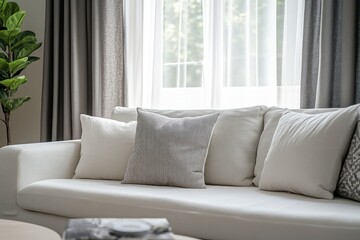 Comfortable White Couch with Pillows in a Bright Modern Living Room