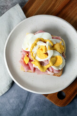 Ham, cheese, and hard-boiled egg sandwich