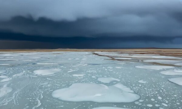 Bonneville Salt Flats landscape with rain storm clouds in distance