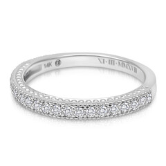 Woman holding engagement ring