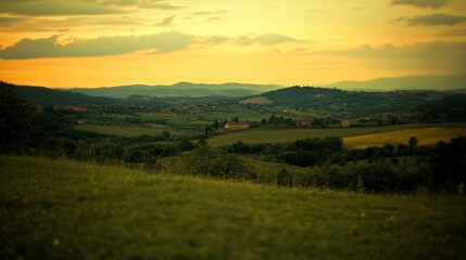 Obraz premium Serene Landscape at Dusk with Rolling Hills and Golden Sky
