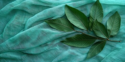 Emphasizing freshness and nature with henna leaves and fabric texture.