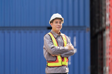 Import and export container, Worker inspecting and control of container. Male worker working and...