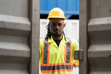 Import and export container, Worker inspecting quality control of container. Male worker working and checking inside container boxes at container yard