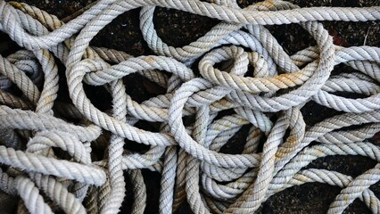 industrial white rope snaking as background