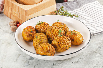 Baked baby potato with thyme