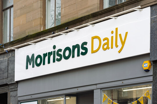 DUNDEE, UK - March 22, 2025: Morrisons Daily High Street Convenience Retail Store Next to Virgin Money in City Centre