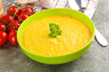 Vegetarian corn cream soup served parsley
